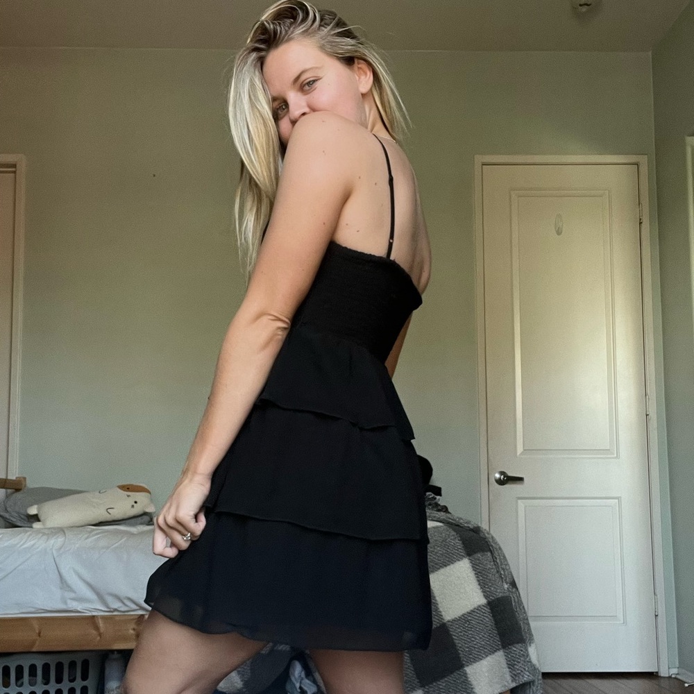 Black ruffle dress.